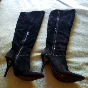 Black knee-high stiletto boots